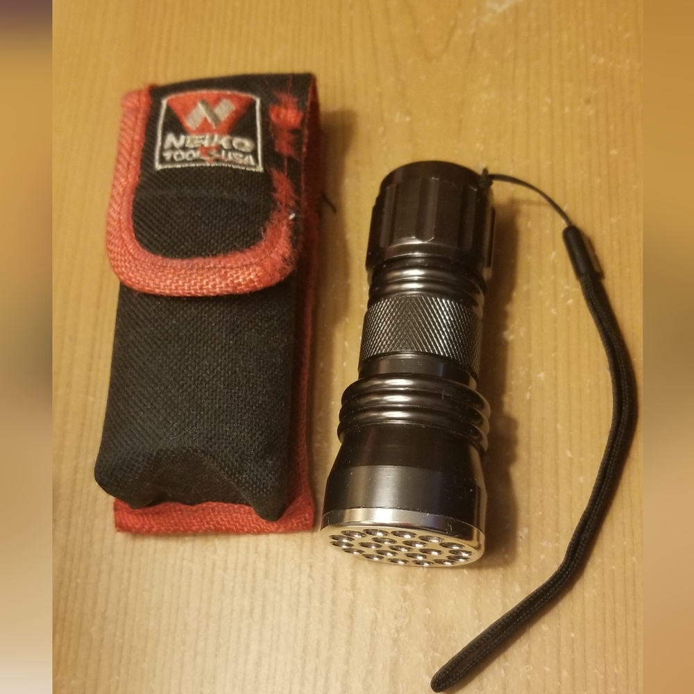 Led solid steel tactical flashlight